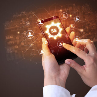 Female,Hand,Holding,Smartphone,With,5g,Abbreviation,,Modern,Technology,Concept