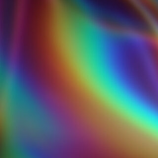 Abstract vibrant blurred background in holographic colors.